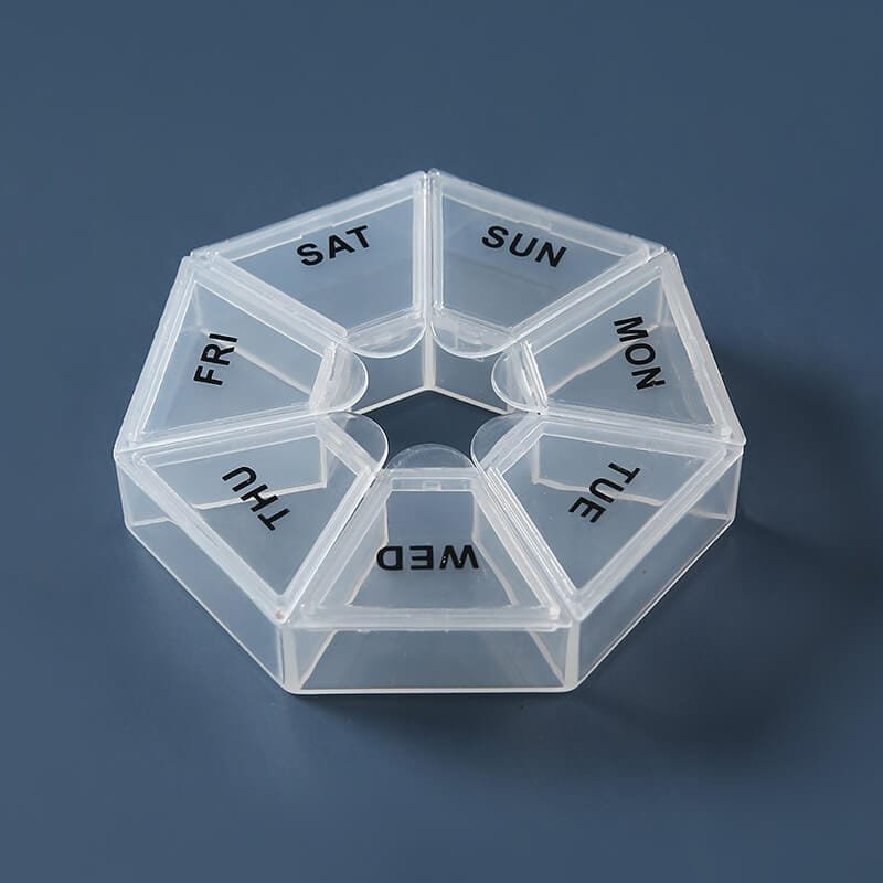 weekly heptagonal pill box 9